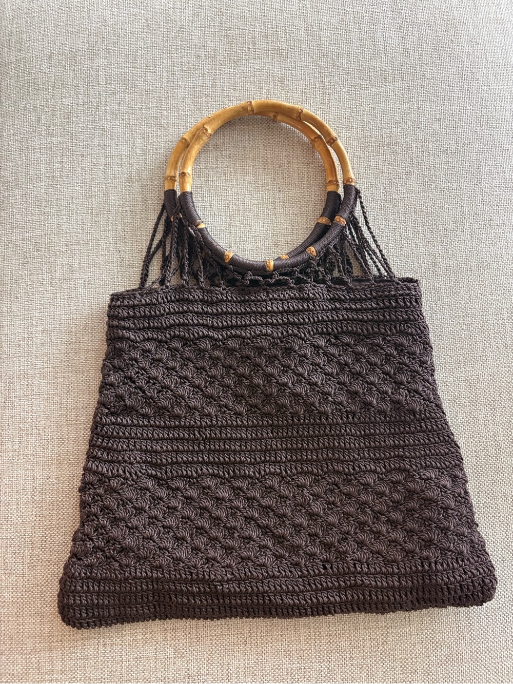 Chocolate brown woven handbag with bamboo ring handles